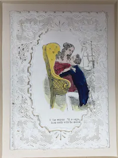 A Valentine's Day card with a man kneeling in front of a woman seated on an armchair, hugging her, within a lace-paper frame.