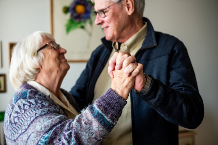A senior couple dancing.