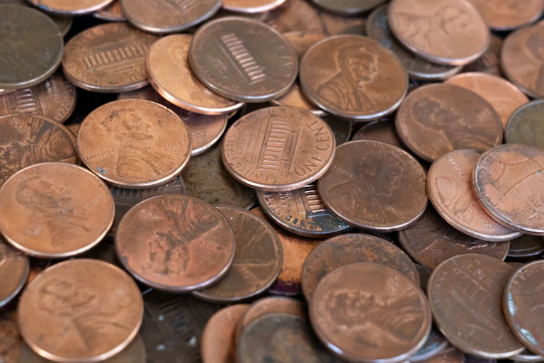 A close-up of a pile of pennies.