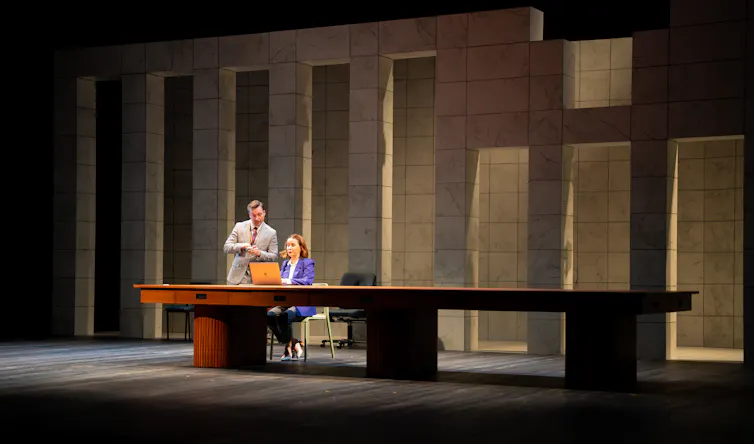 The set, with large white stone frontage.