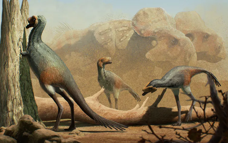 Two long-tailed dinosaurs investigate a tree, two larger dinosaurs in the background.