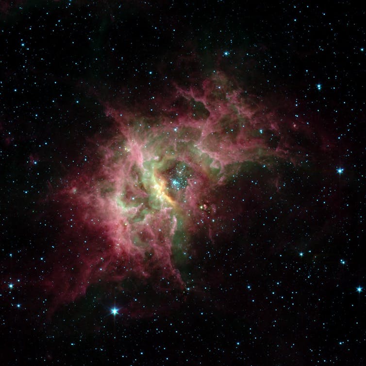 NASA’s new telescope will create the ‘most colourful’ map of the cosmos ever made 4 Cloud of pink and green dust surrounded by stars.