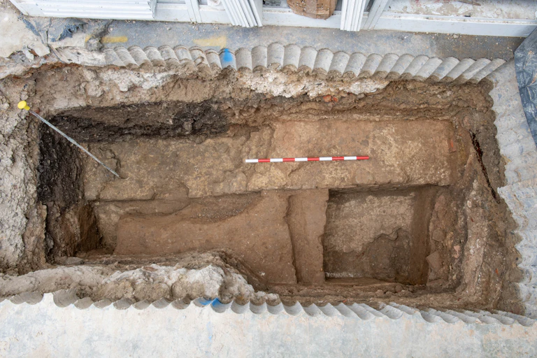 A dig pit showing layers of walls