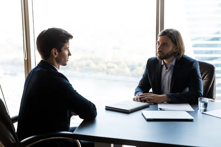 Two men having a meeting in an office