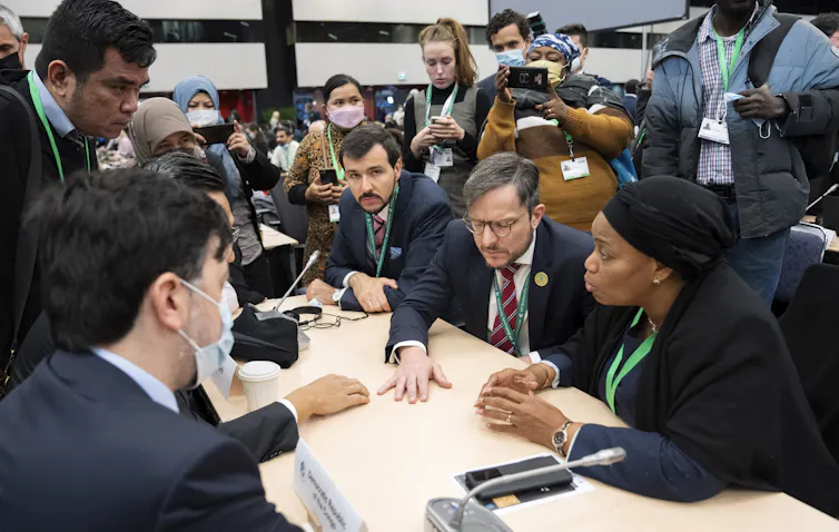 meeting delegates talk at table