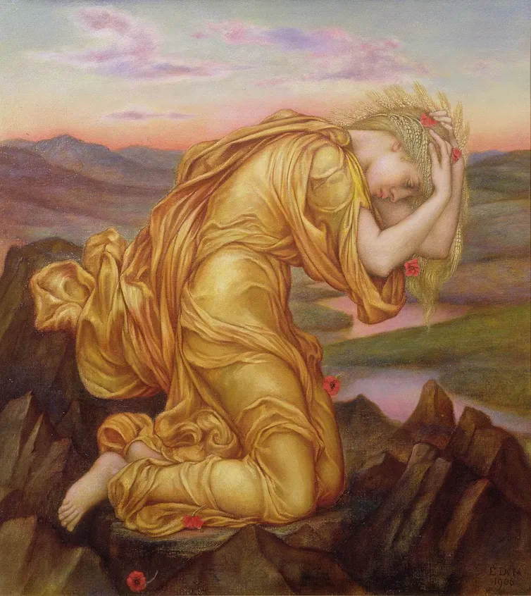 Oil painting: woman dressed in gold holds her head in her hands.