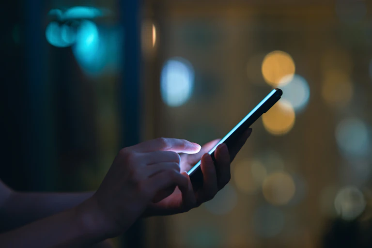 hand holding a mobile phone