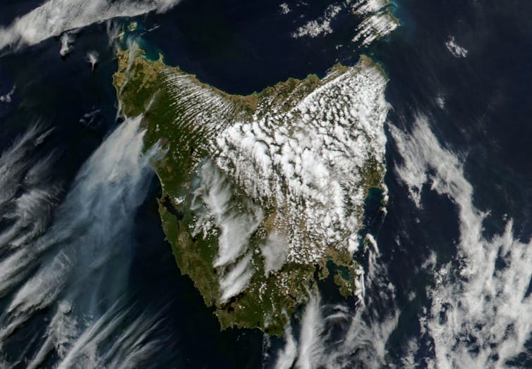 A satellite image showing smoke billowing from Tasmania, acquired at 4pm local time on February 12, 2025.