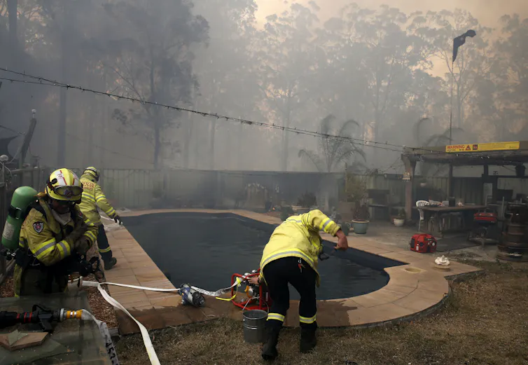 houses backing onto bushland