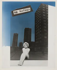 A poster of a woman sitting beneath some soulless brutalist architecture.