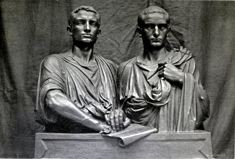 Pronouncing to save lots of his nation, Trump states the cicero and refers to a foul precedent 1 The statue of two men together, holding the document.
