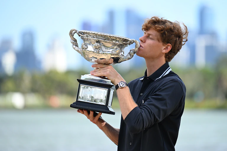 Jannik Sinner celebrates with his Australian Open title