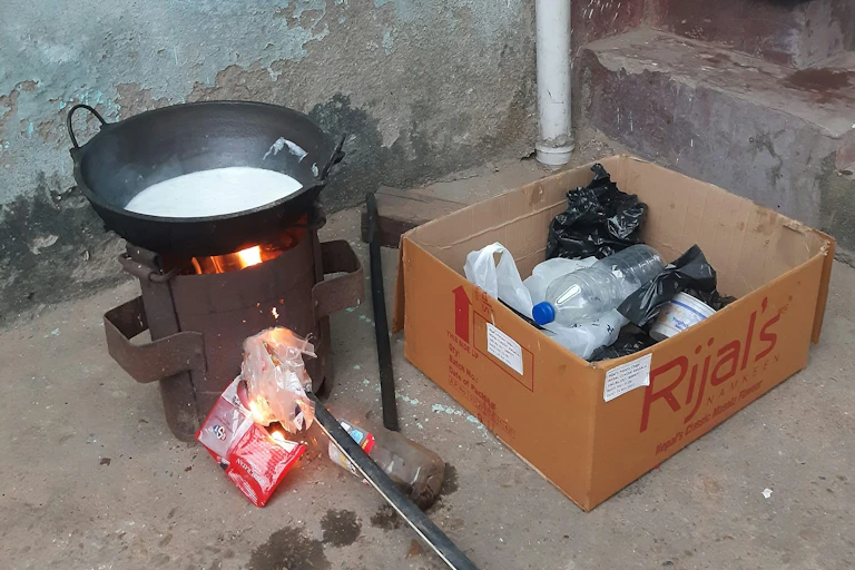 Burning plastic waste in a home in Kathmandu, Nepal.
