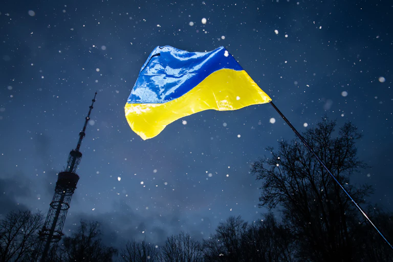 Ukrainian flag against the night sky