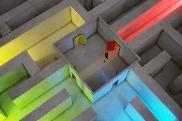 Bird's-eye view of a man walking through a maze with multicolored hallways.