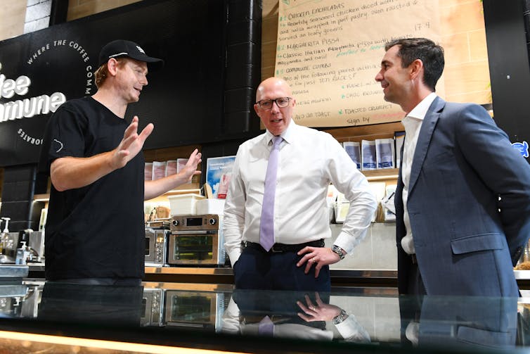 Peter Dutton speaks with a voter in Brisbane.