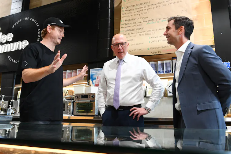 Peter Dutton speaks with a voter in Brisbane.