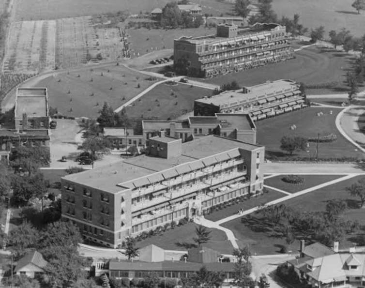 A black and white photo of a large building