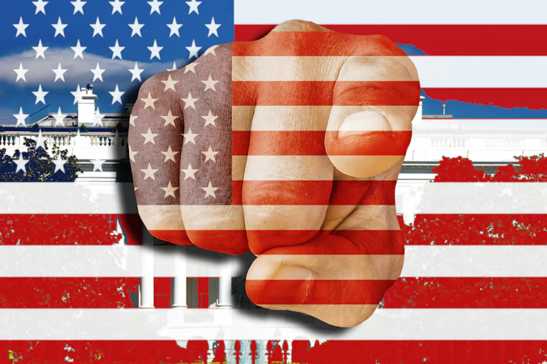 A fist superimposed on an American flag