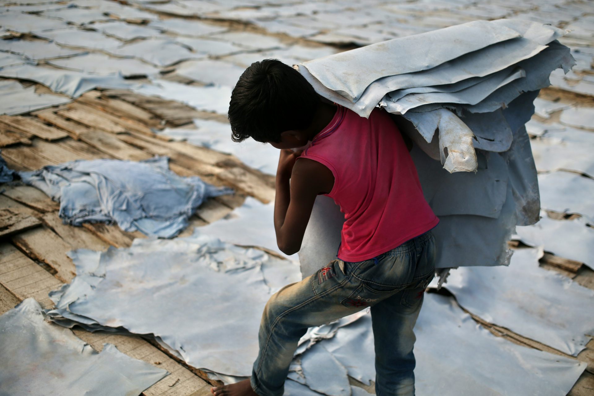 Child working at a leather tannery in a low-income area in Dhaka, Bangladesh