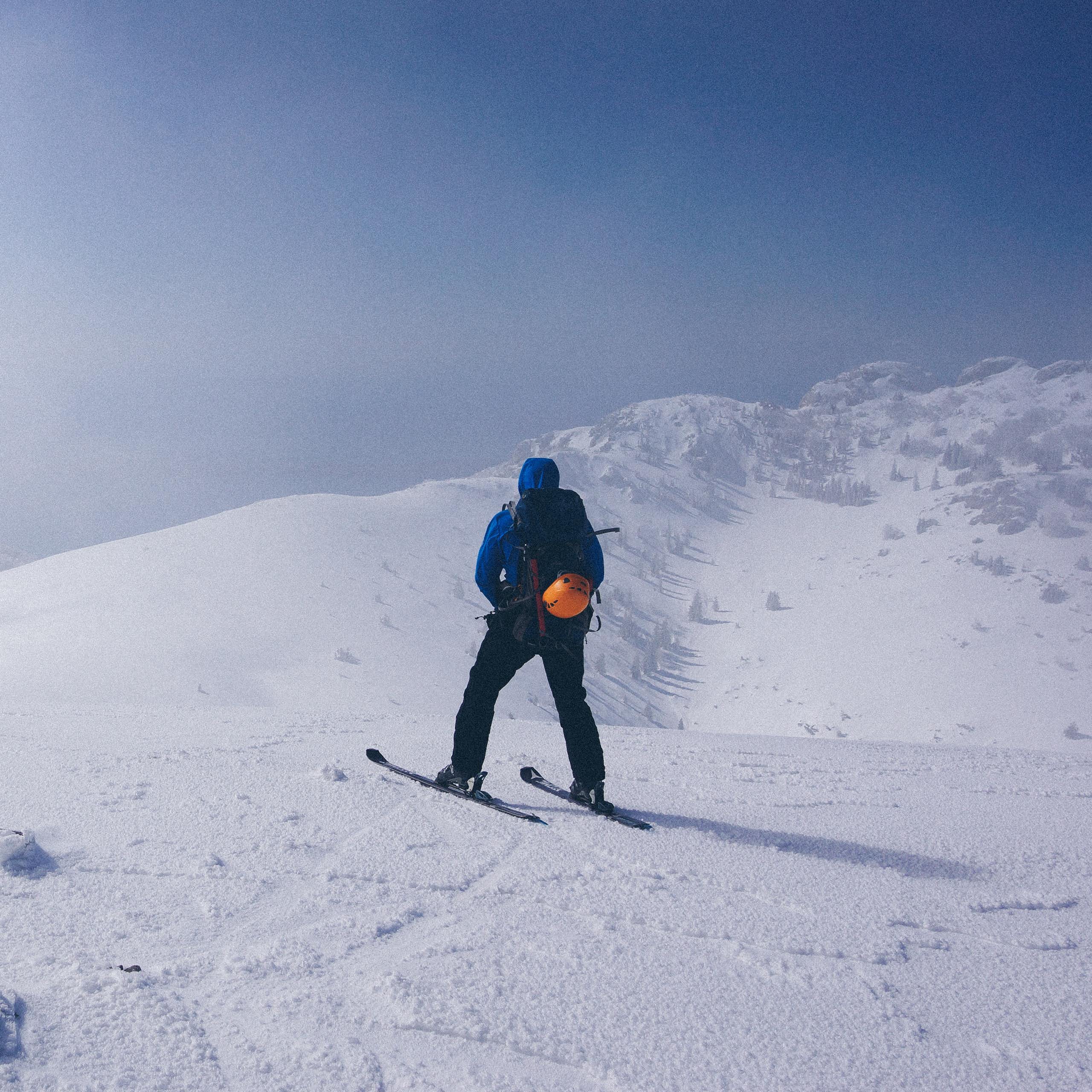A skier on a ski slope.