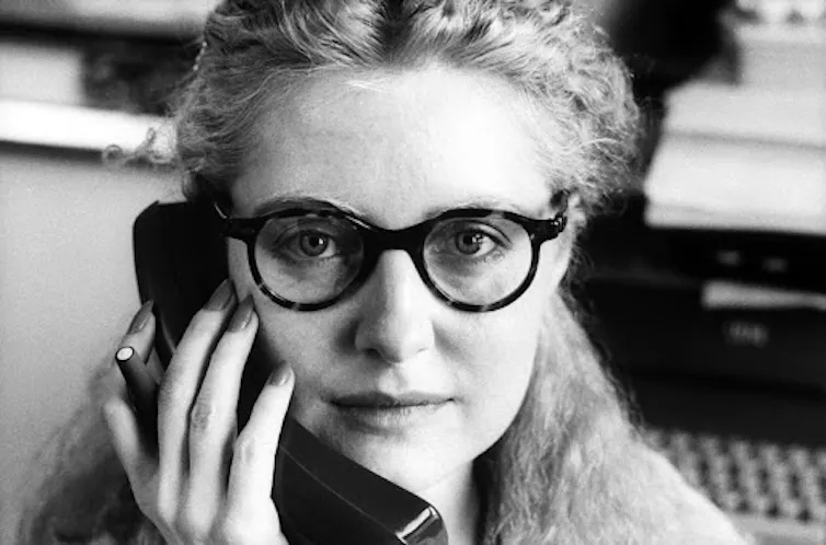 A close up of Hite on the phone.