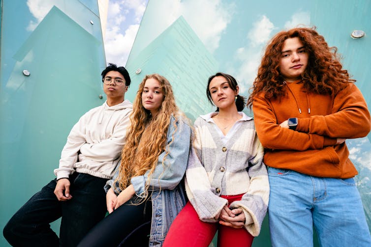 Young people looking serious.