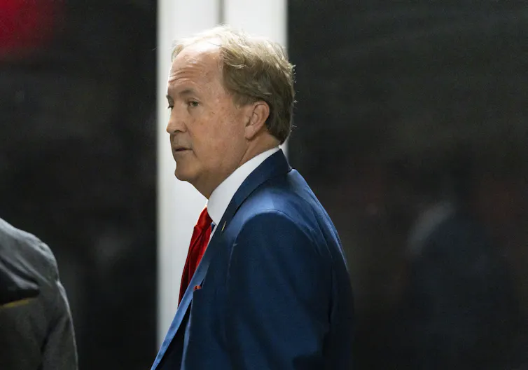 Profile photo of Paxton in a suit