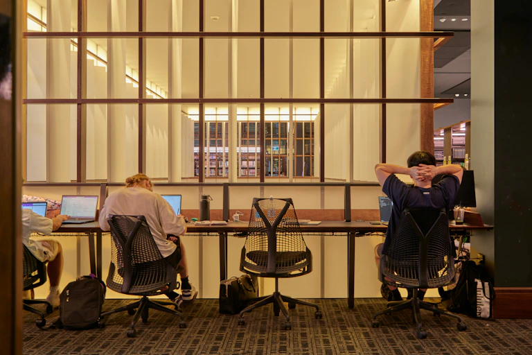 Students studying in a university library