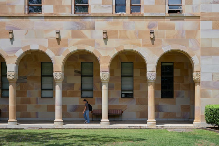 Student walking on university campus