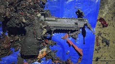 Une arme à feu calcinée