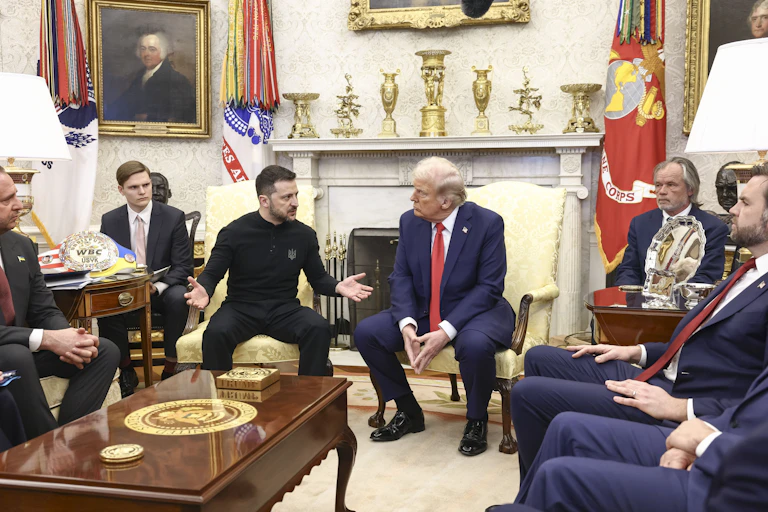 Ukrainian president Volodymyr Zelensky, gestures as he talks with US president Donald Trump and his aides, including US vice-president J.D.Vance at the White House.