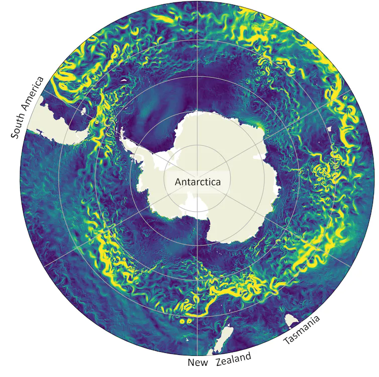 A composite image of the globe from space showing the Antarctic Circumpolar Current in green and yellow around Antarctica.