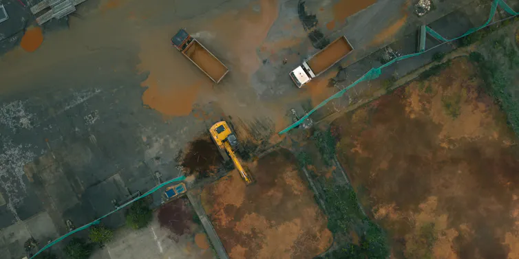 Industrial waste being removed.