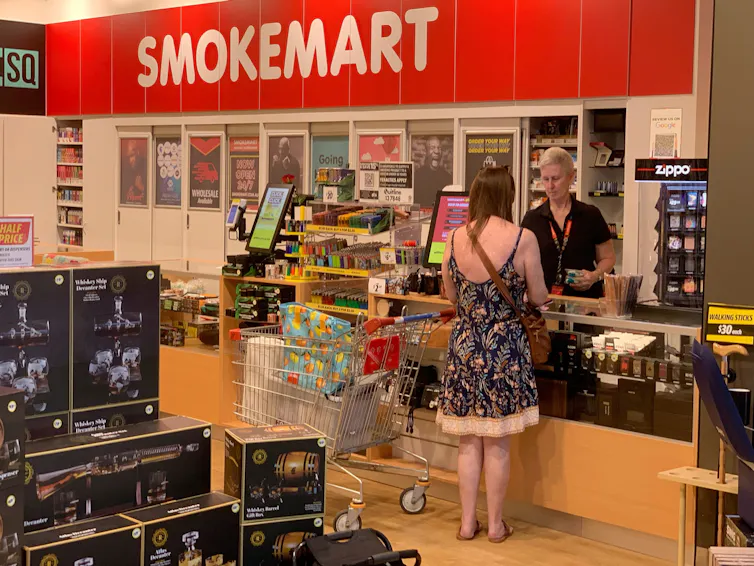 Woman buys tobacco products
