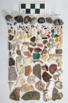 A neatly arranged collection of various shards and pieces, as well as pumice (volcanic rock that floats).