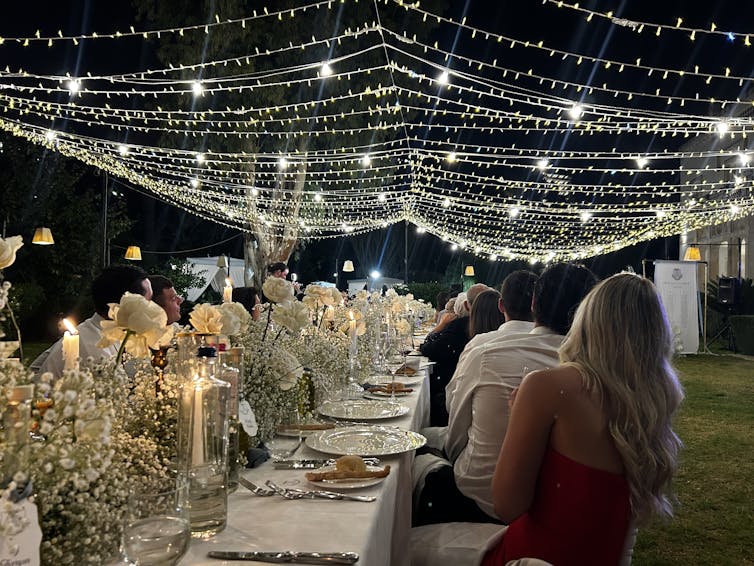 How one can write a really perfect wedding ceremony speech – in line with historic orators 2 A wedding venue laid out with a table and lights