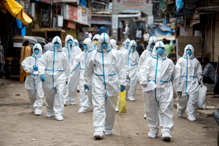 Healthworkers wearing protective clothing in Mumbai, India.
