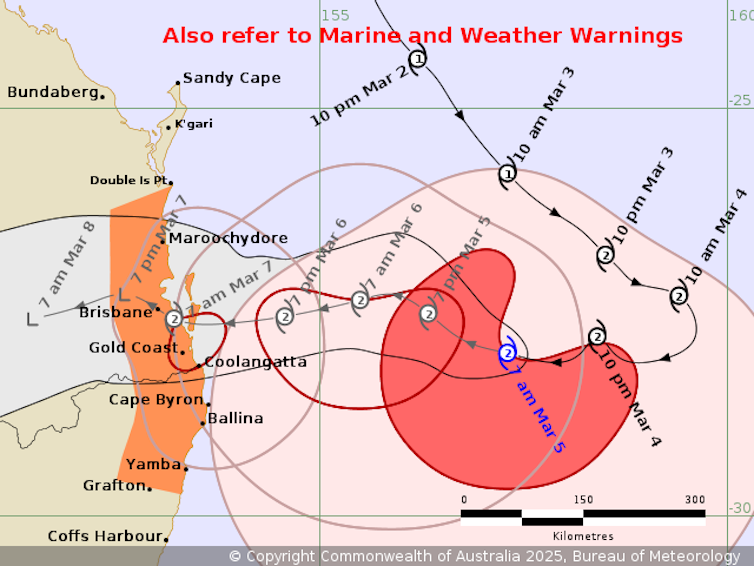 A cyclone tracking map showing potentially affected area of the coast in orange and cyclone in red and pink