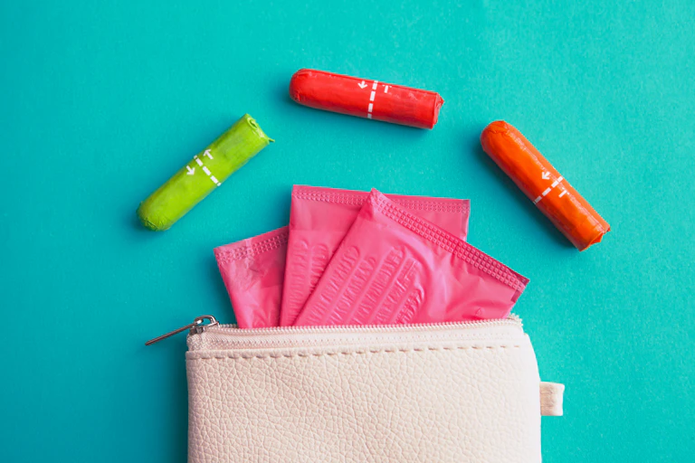 A purse with pads and tampons.