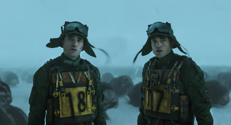 Robert Pattinson in futuristic space combat clothing