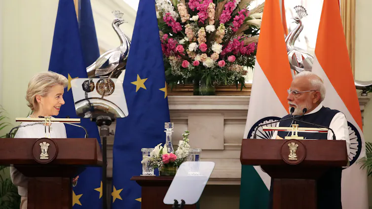Ursula von der Leyen and Narendra Modi holding a press conference.