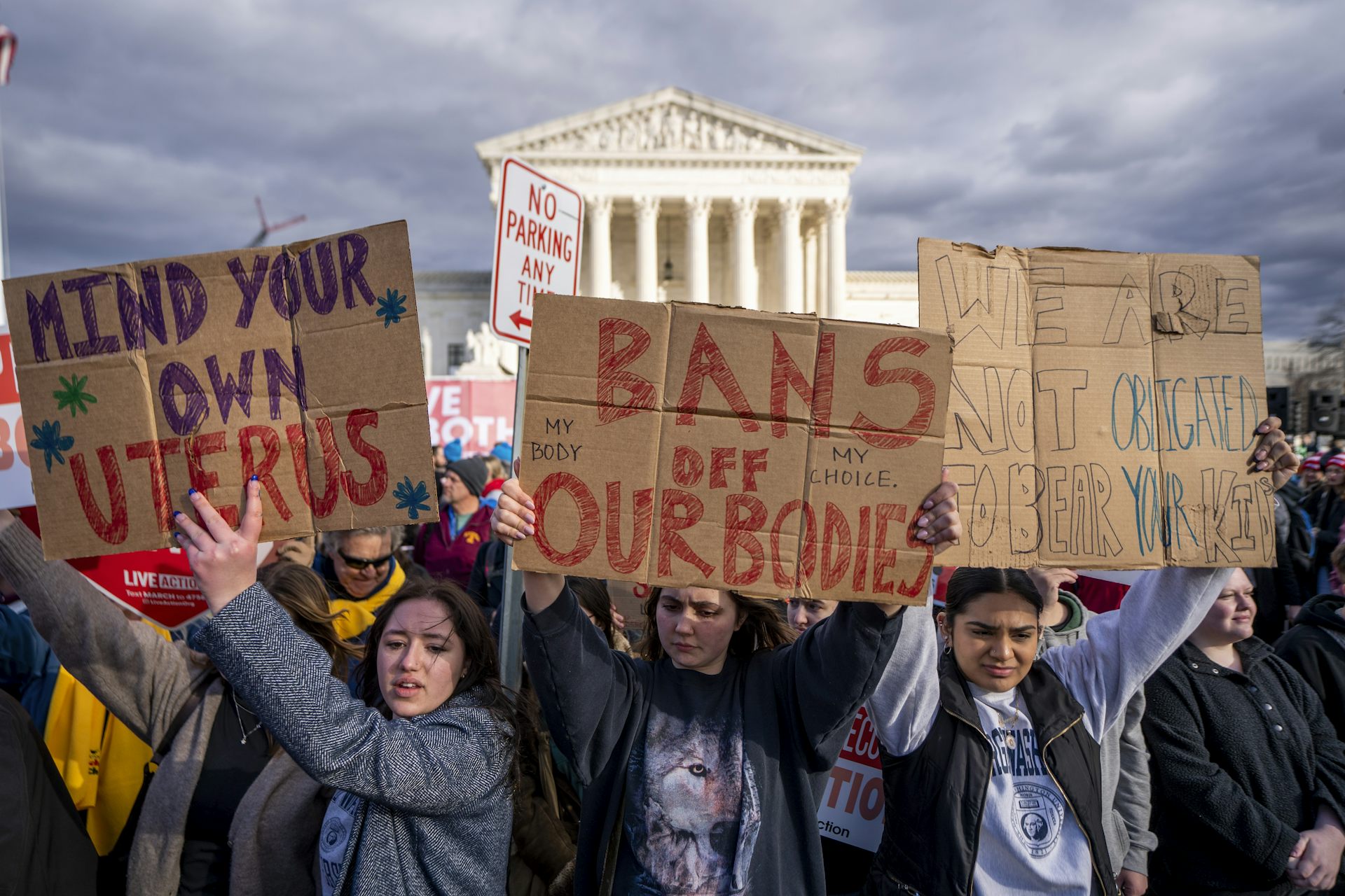 Women holding pro-choice banners outside of the Supreme Court