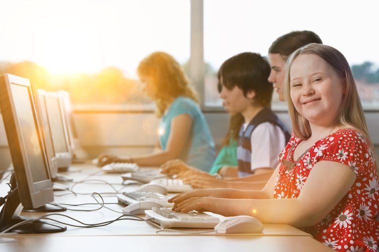Girl at a desk.