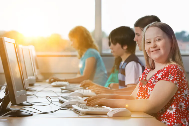 Girl at a desk.