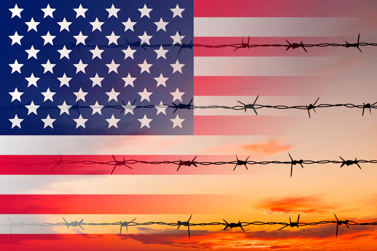 American flag with barbed wire overlaid