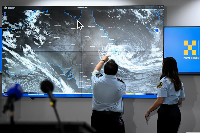 Members of the SES inspect Tropical Cyclone Alfred on the Bureau of Meteorology (BOM) satellite view.