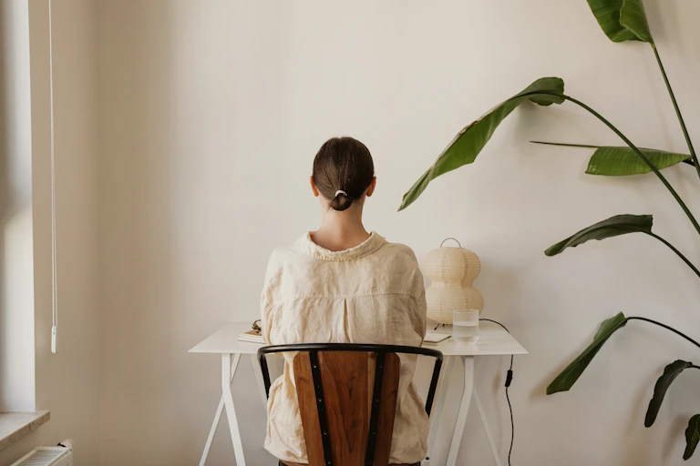 Woman working from home at a desk