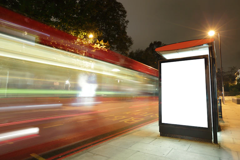 Blank billboard at a bus stop