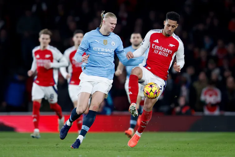 Arsenal and Man City players in a recent premier league match